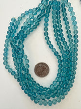 color enhanced quartz: dark pale electric blue, 7mm round, 13.5" strand,  SOLD PER STRAND