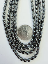 hematite, 6x4mm bowed tube, 15" strand, sold per strand