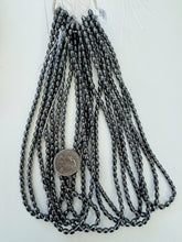 hematite, 6x4mm bowed tube, 15" strand, sold per strand