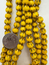 color enhanced yellow chinese symbol wood,  9mm round, 15" strand,  SOLD PER STRAND (Copy)