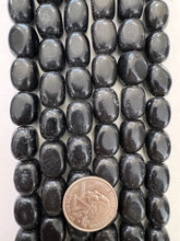 onyx, surface wear, 16x13x13mm tumbled nugget mix, 15" strand,  SOLD PER STRAND