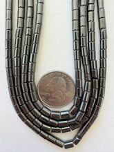 hematite, 6x4mm tube, 15" strand, sold per strand