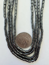 hematite, 4x3mm tube, 15" strand, sold per strand