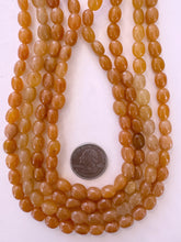 red aventurine, 10x7mm nugget, 15" strand, sold per strand