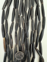 black horn, 25-40mm random assortment tube, 15" strand, sold per strand