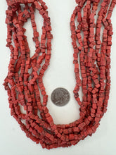 color enhanced howlite: pale red, 10mm off center drilled cube mix , 30" strand,  SOLD PER STRAND