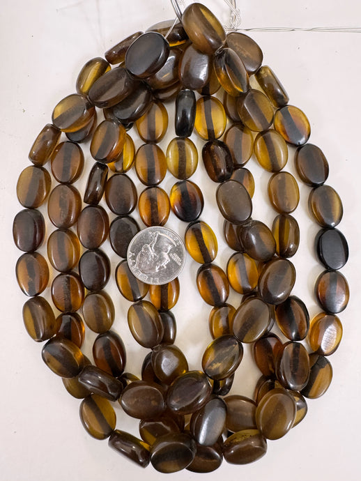 dark golden amber, vintage look resin, 18x14x7mm barrel, 15