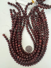 color enhanced serpentine: very dark red orange, 8mm round, 15" strand, sold per strand