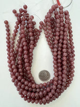 color enhanced quartz: pale ruby red, 8mm round, 15" strand, sold per strand
