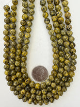 color enhanced serpentine: yellow, 8mm round, 15" strand, sold per strand