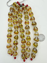 clear red orange yellow, swirl motif, vintage stock glass, 16x14mm barrel, 6" strand, SOLD PER STRAND