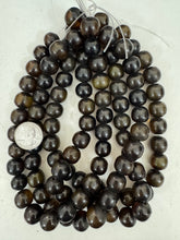 very dark olive green, single color, vintage look resin, 16mm nugget round, 15" strand, sold per strand