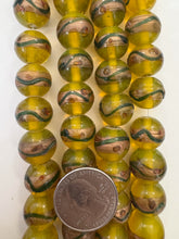yellow green copper red, dot swirl motif, vintage stock glass, 15mm round, 6" strand, SOLD PER STRAND