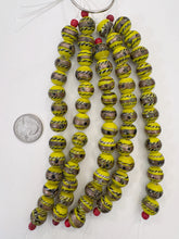 yellow copper black white, dot swirl motif, vintage stock glass, 13mm round, 6" strand, SOLD PER STRAND