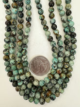 african turquoise, 6.5mm round, 15" strand, sold per strand
