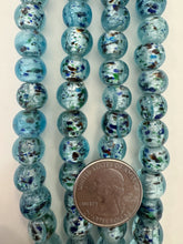 light blue multi silver, inside lined motif, vintage stock glass, 12mm round, 6" strand, SOLD PER STRAND