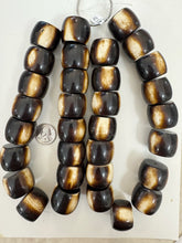 chocolate brown off white, faux bone motif, vintage look resin, 30x24mm slice rondelle, 15" strand, sold per strand