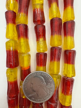 red yellow, two tone motif, vintage stock glass, 22x9mm dent tube, 6" strand, SOLD PER STRAND