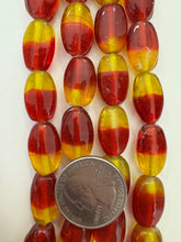 red yellow, two tone motif, vintage stock glass, 19x12x8mm oval, 6" strand, SOLD PER STRAND