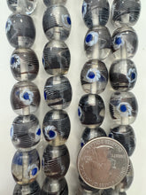 clear very dark purple white blue, dot swirl motif, vintage stock glass, 17x14mm barrel, 6" strand, SOLD PER STRAND