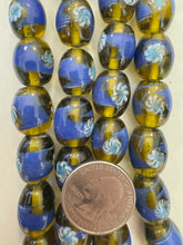 dark green yellow blue white, dot swirl motif, vintage stock glass, 17x14mm barrel, 6" strand, SOLD PER STRAND