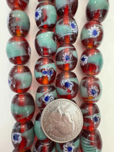 red green blue white, dot swirl motif, vintage stock glass, 17x14mm barrel, 6" strand, SOLD PER STRAND
