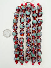 red green blue white, dot swirl motif, vintage stock glass, 17x14mm barrel, 6" strand, SOLD PER STRAND