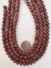 color enhanced serpentine: dark red orange,  8mm round, 15" strand, sold per strand