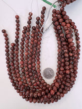 color enhanced serpentine: dark red orange,  8mm round, 15" strand, sold per strand