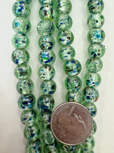 light green multi silver, inside lined motif, vintage stock glass, 11mm round, 6" strand, SOLD PER STRAND