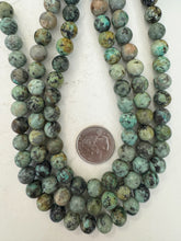 african turquoise, 10mm round, 15" strand, sold per strand