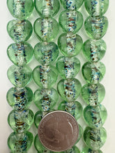 saturated dark pale green multi silver, inside lined motif, vintage stock glass, 15x15x8mm heart, 6" strand, SOLD PER STRAND