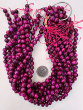 color enhanced tiger eye: magenta, 8mm round, 15" strand, sold per strand