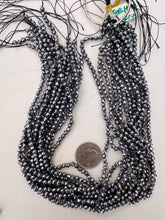 terahertz, 4mm faceted round, 15" strand, sold per strand