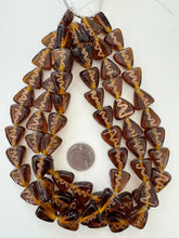 root beer brown copper, squiggle line motif, vintage stock glass, 18x18x8mm triangle, 15" strand, SOLD PER STRAND