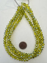 dark lime green, blue ab coated, glass, 8x7mm fancy cut faceted rondelle, 15" strand, SOLD PER STRAND