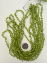 peridot, 7x3mm chip nugget, 30" strand, sold per strand