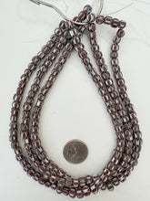 brown white black, chevron motif, matte finish, vintage stock glass, 7-8mm barrel mix, 15" strand, SOLD PER STRAND
