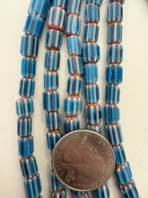 dark teal blue white red, chevron motif, semi dull finish,  vintage stock glass, 8x7mm barrel mix, 15" strand, SOLD PER STRAND