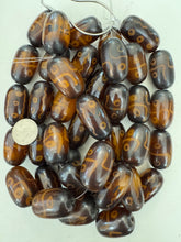 dark brown golden mixed line circle motif ,faux bone, vintage look resin, 38x22mm tube, 15" strand, sold per strand