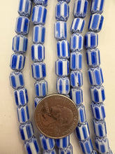 blue white, chevron motif, semi dull finish, vintage stock glass, 10x8mm barrel mix, 15" strand, SOLD PER STRAND