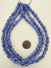 blue white, chevron motif, semi dull finish, vintage stock glass, 10x7mm barrel mix, 15" strand, SOLD PER STRAND