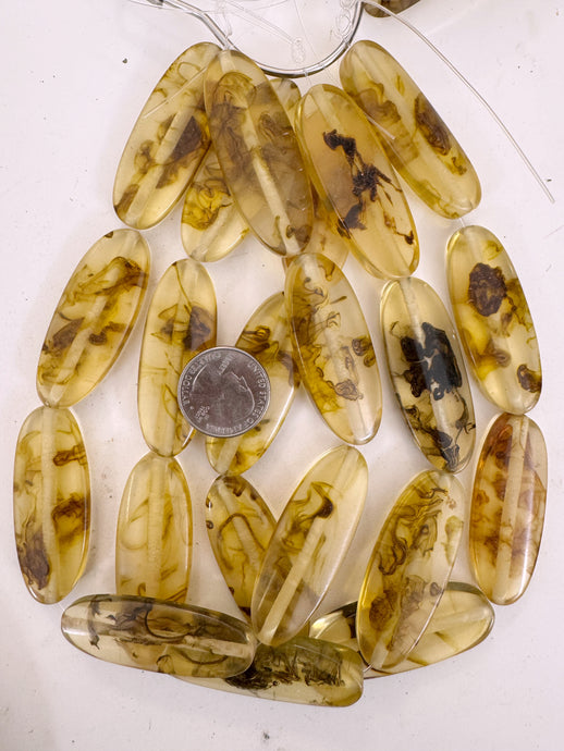 black golden swirl, vintage look resin, 53x19x8mm oval, 15