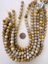 fossil coral, 10mm round, 15" strand, sold per strand