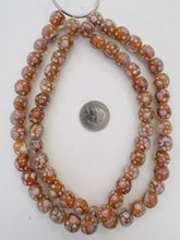 clear dark pale burnt orange green pink white, floral inside lined motif, semi dull finish, vintage stock glass, 12mm round mix, 15" strand, SOLD PER STRAND