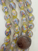 clear pale yellow blue pink white, floral inside lined motif, semi dull finish, vintage stock glass, 14x12mm barrel mix, 15" strand, SOLD PER STRAND