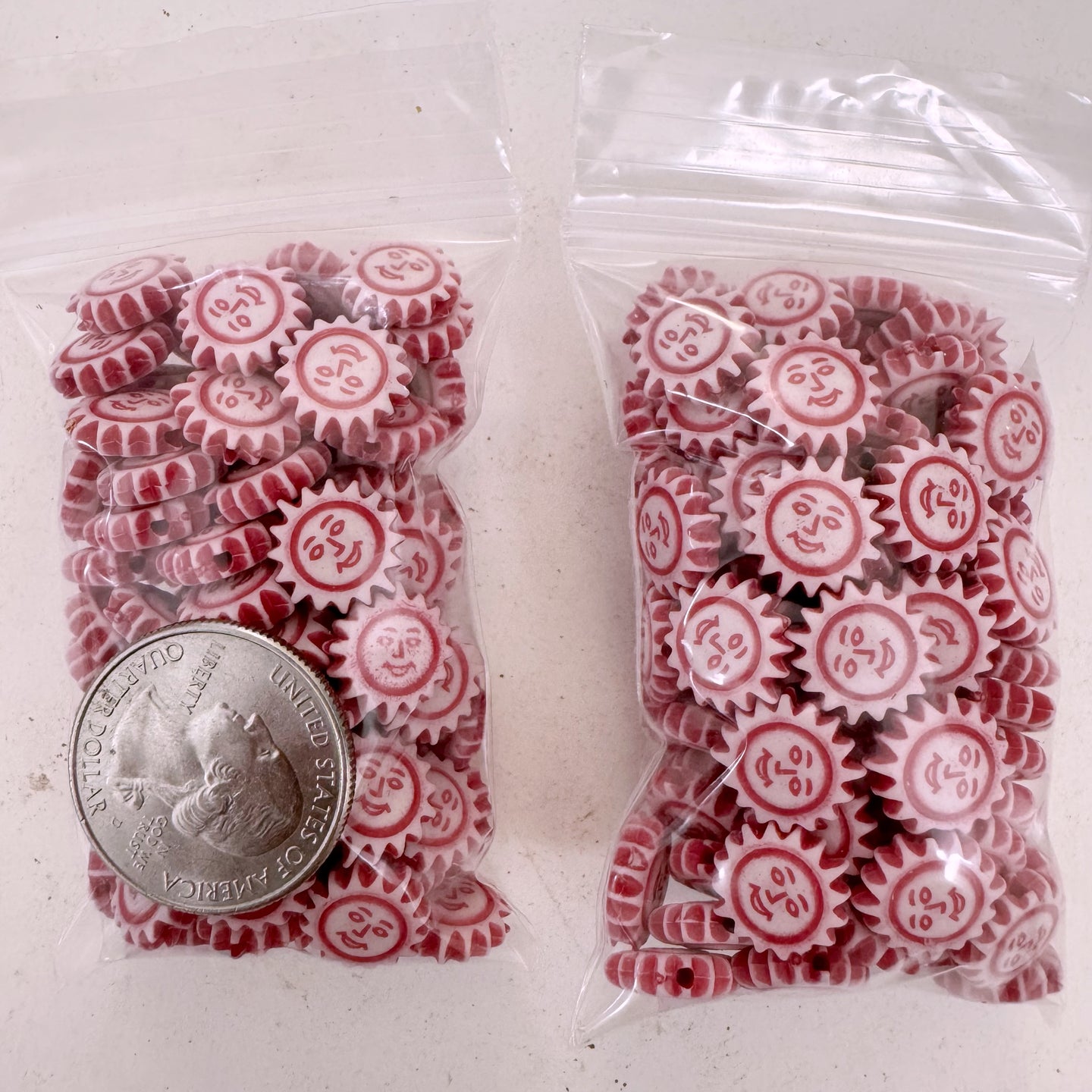 white magenta, carved design sun face, vintage look acrylic, 11x11x3mm sun face coin,  sold per approximately 28 gram bag