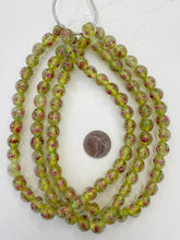 clear yellow green pink white, floral inside lined motif, semi dull finish, vintage stock glass, 12mm round mix, 15" strand, SOLD PER STRAND