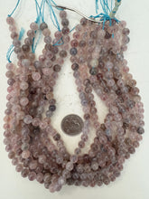 color enhanced quartz: pale mixed lavender tones, 8mm round, 15" strand, sold per strand