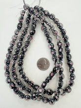clear black pink white, floral inside lined motif, semi dull finish, vintage stock glass, 11-12mm round mix, 15" strand, SOLD PER STRAND